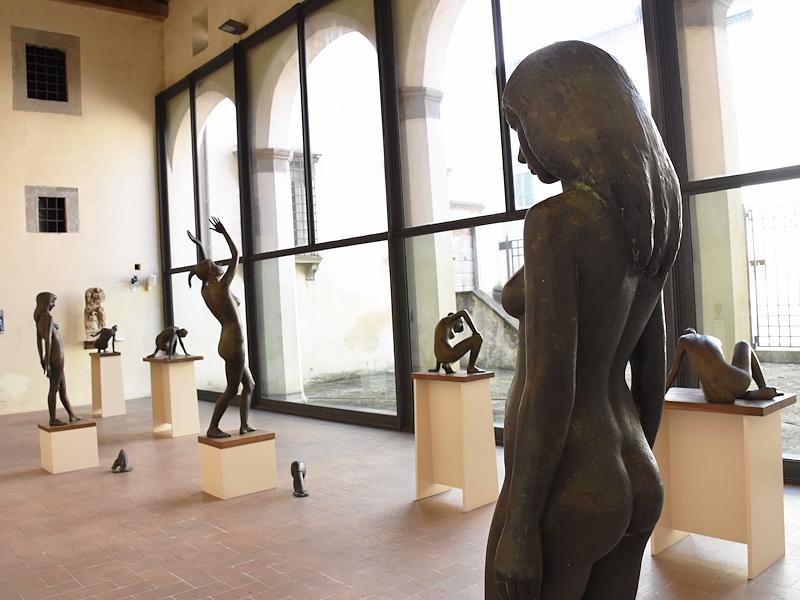 Bronzes by Bruno Bartoccini displayed in a bright room of the Palazzo Vitelli Art Gallery.
