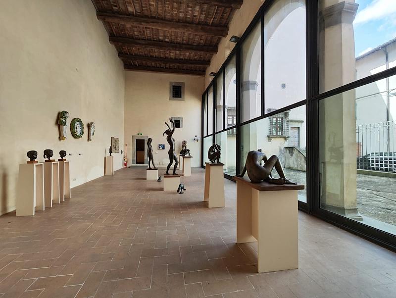 Bronzes by Bruno Bartoccini displayed in a bright room of the Palazzo Vitelli Art Gallery.