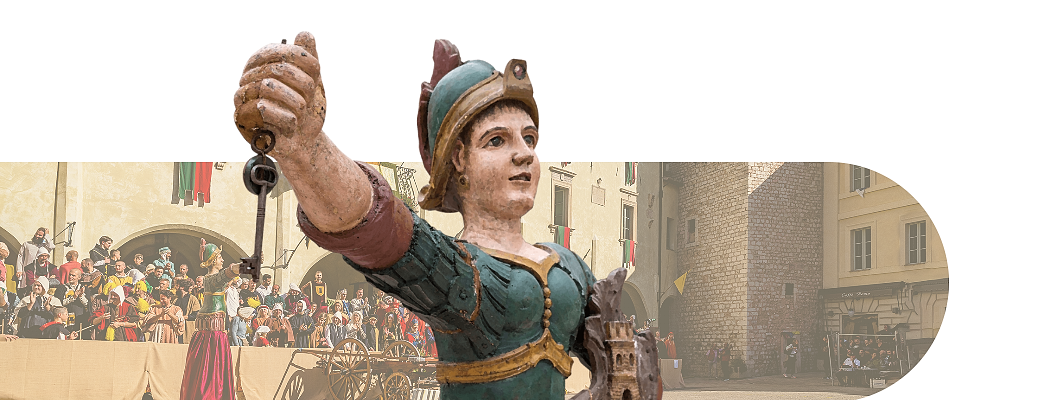 representative statue of the event and image of the palio.