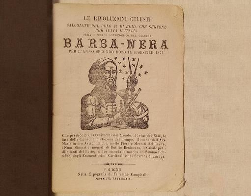 Copertina di un almanacco Barbanera del 1872 con illustrazione di un uomo con barba, stelle e strumenti astrologici.