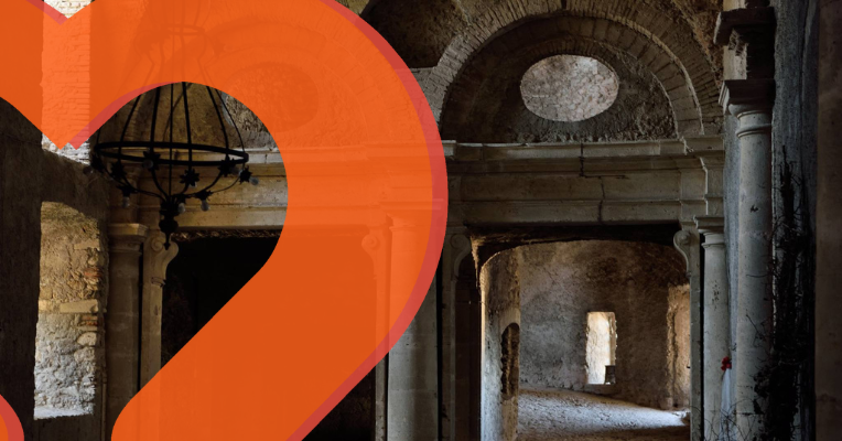  Stone interior with arches and columns of an ancient building in Giove, illuminated by natural light. 