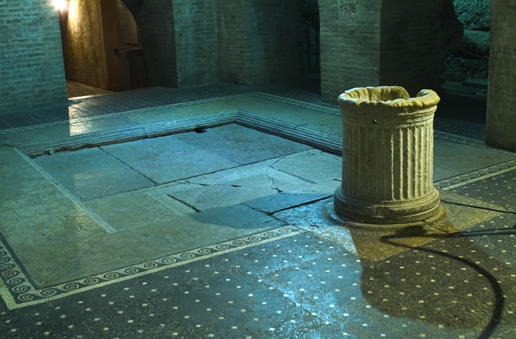 View of the impluvium in the centre of the atrium of the Roman house of Spoleto, with the water collection basin and the entrance to the well