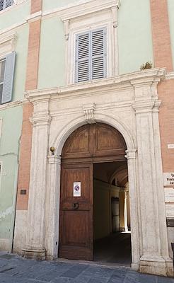 Monumental entrance of Palazzo Conestabile Della Staffa, residence of Guido Pompilij and the poet Vittoria Aganoor.