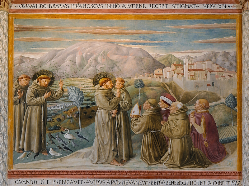 Fresco by Benozzo Gozzoli showing Saint Francis blessing Montefalco, depicted in the background.